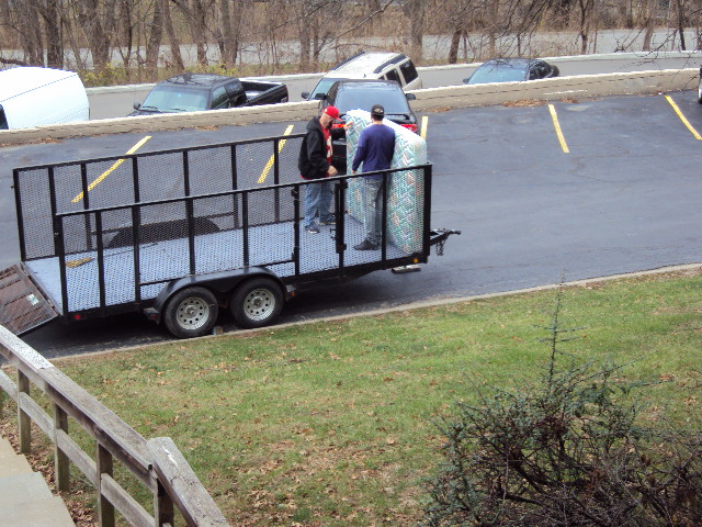 loading mattress into trailer